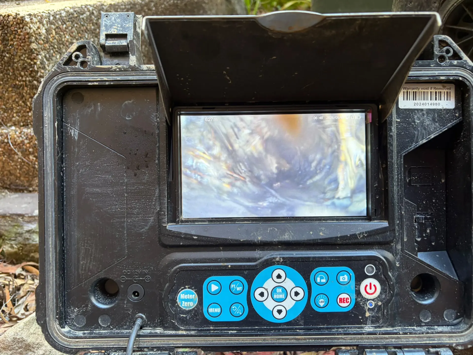 CCTV drain inspection camera screen showing the inside of a blocked pipe